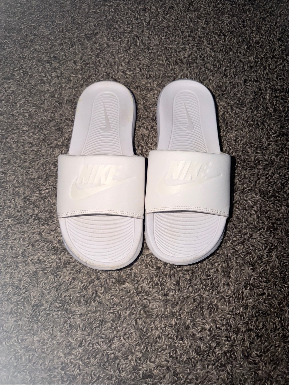 Nike Womans White Slide Sandals with Embossed Logo size 7 Worn only three times.